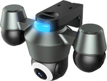 quad-lens varifocal PTZ camera, studio white background, front view